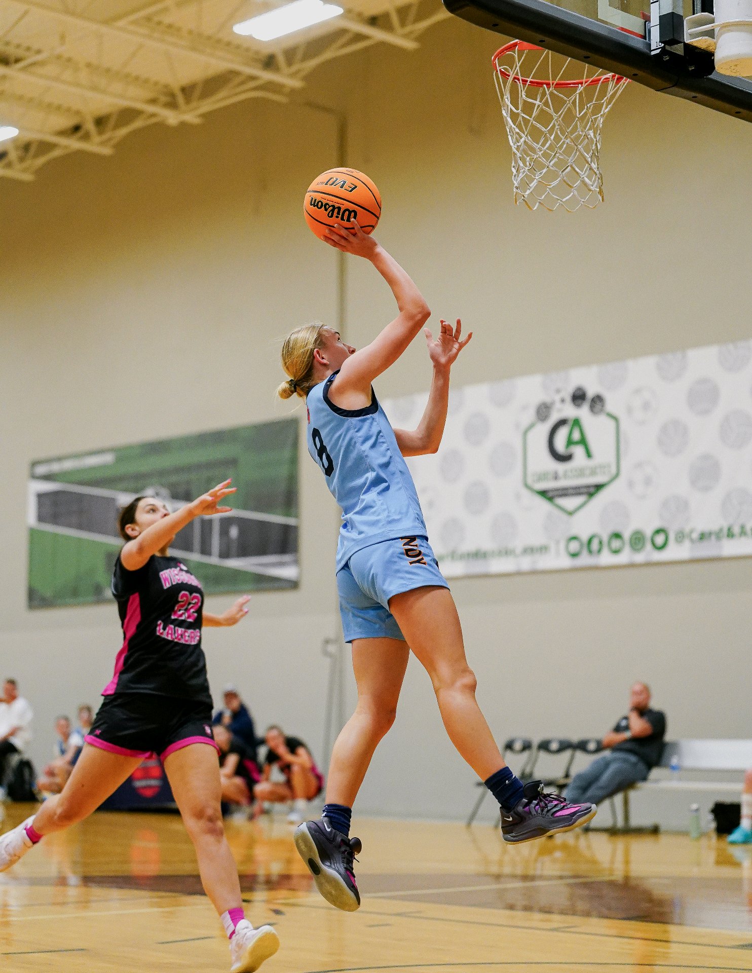 Kate rising for a layup